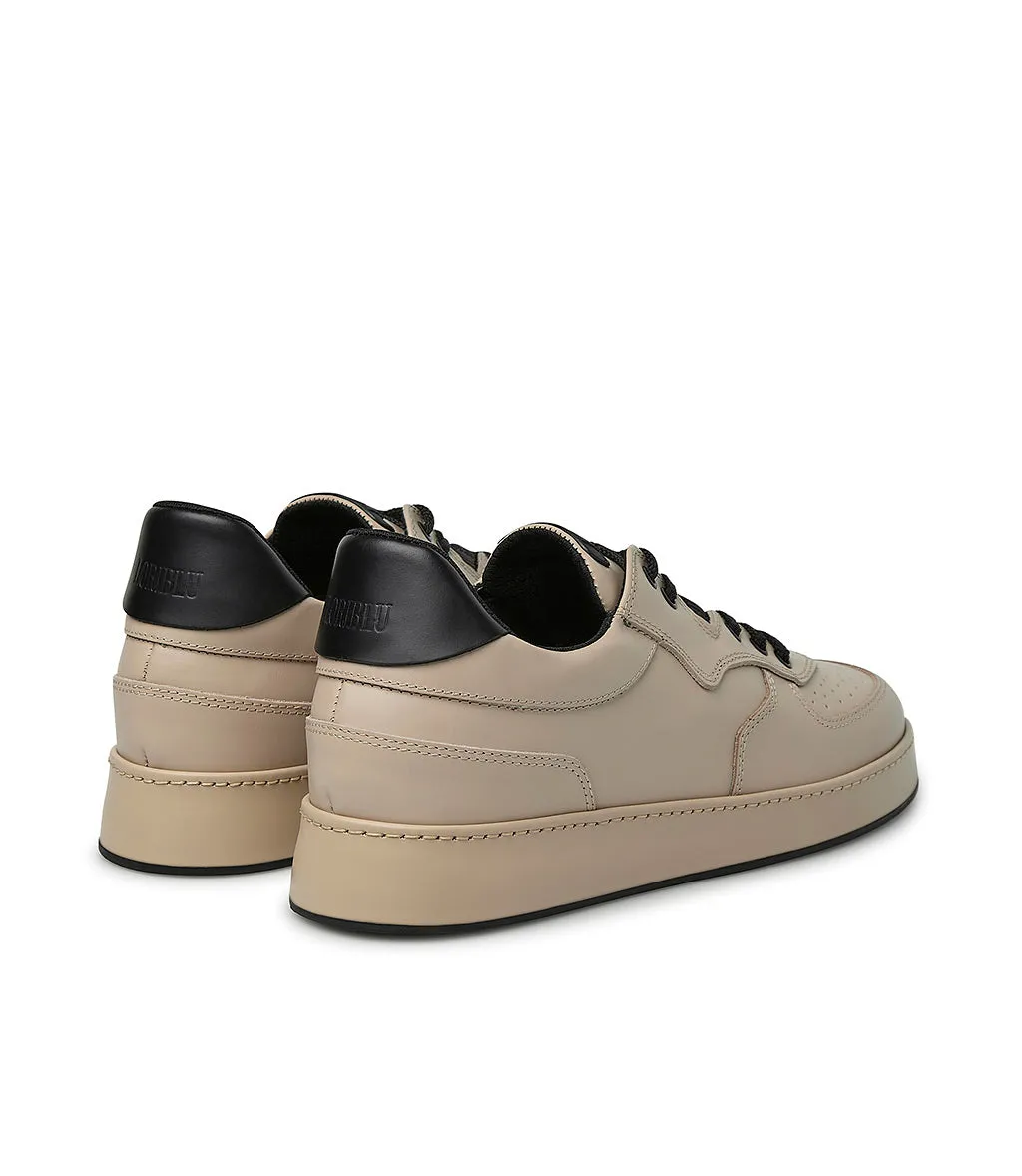 Beige and black leather sneakers