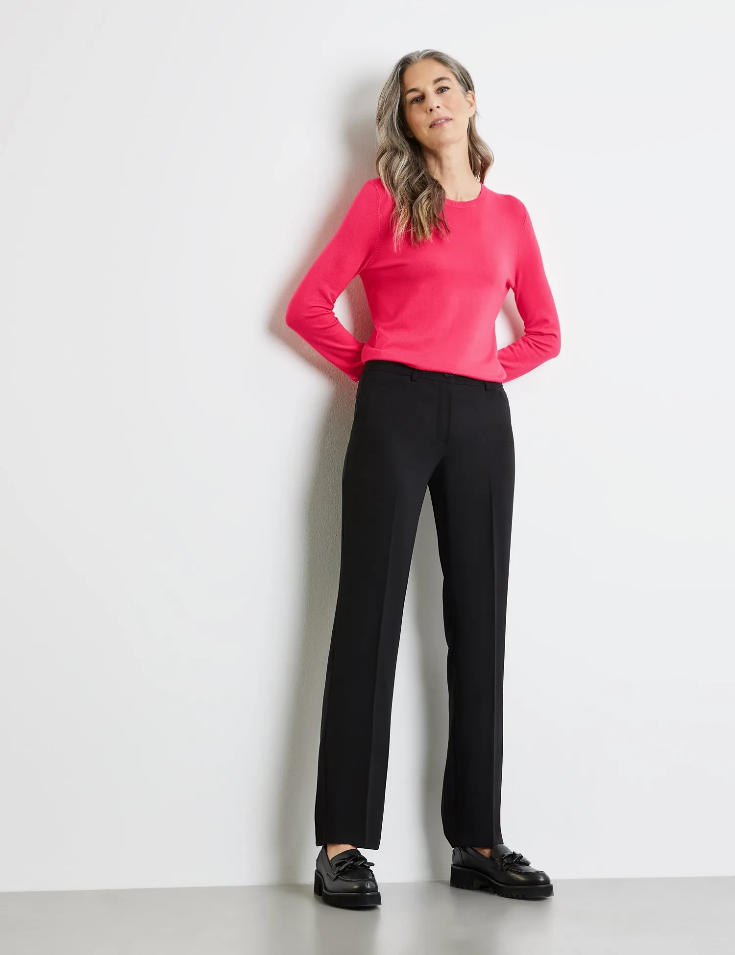 Simple trousers with pressed pleats