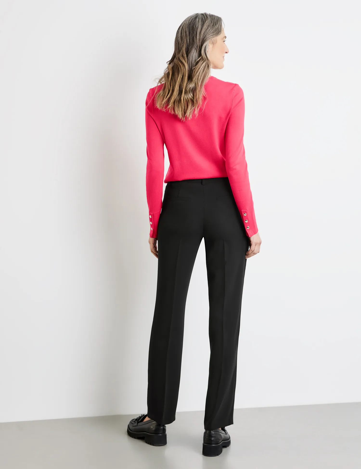 Simple trousers with pressed pleats