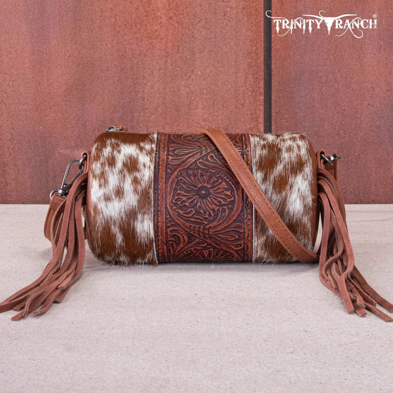 TR159-154  Trinity Ranch Genuine Hair-On Cowhide /Tooled Fringe Collection Barrel Crossbody