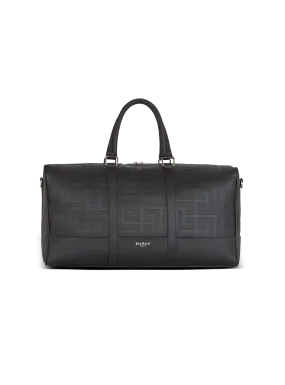 Travel bag in grained leather